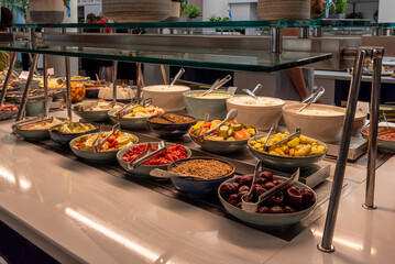 Typical Israeli breakfast buffet at any hotel. Variety of pickled foods including vegetables, beets...