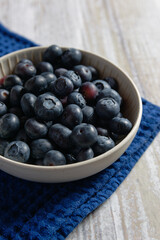 Close up of blueberries in white bowl