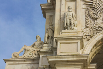 Fototapeta na wymiar Fragment of famous Triumphal Augusta Arch at Praca do Comercio (Commerce Square) in Lisbon