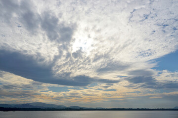 Naklejka na ściany i meble Nice clouds and sky over lake