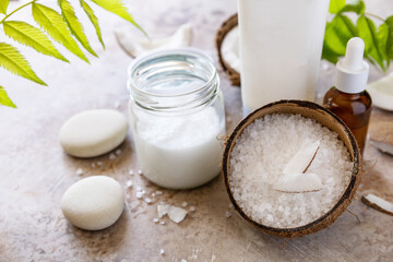 Natural organic cosmetics with coconut butter for body care, spa treatment. Fermented beauty care - coconut oil, bath salt, cosmetic cream, serum and hydrogel eye patches.