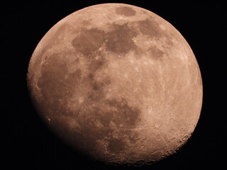 full Moon close up with dark sky in the background 