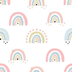 Hand drawn vector seamless background for kids with cute rainbows. On a white background. Wallpaper, textiles, print.