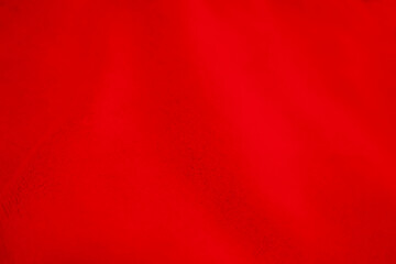 Red clean wool texture background. light natural sheep wool. red seamless cotton. texture of fluffy fur for designers. close-up fragment red wool carpet.