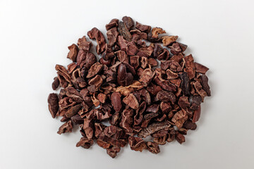 cacao nibs on a white background