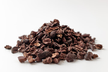 cacao nibs on a white background