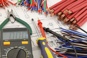 Mounting tools and materials for the installation of an electric panel. On the electrical diagram.