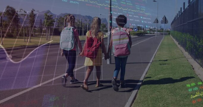 Stock market data processing against three diverse school girls holding hands walking on the street