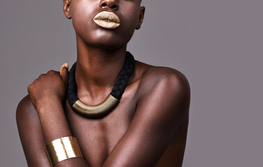 All she needed to wear was her jewellery. Cropped studio shot of a beautiful semi-dressed woman...