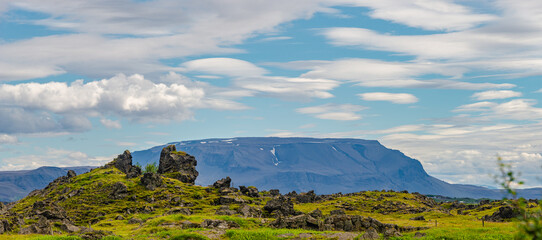 Hiking trail through Hverfjall volcano with classic crater near Reykjahlid and Myvatn lake in Northern Iceland, at summer time.
