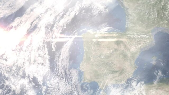 Earth zoom in from outer space to city. Zooming on Barcelos, Portugal. The animation continues by zoom out through clouds and atmosphere into space. Images from NASA