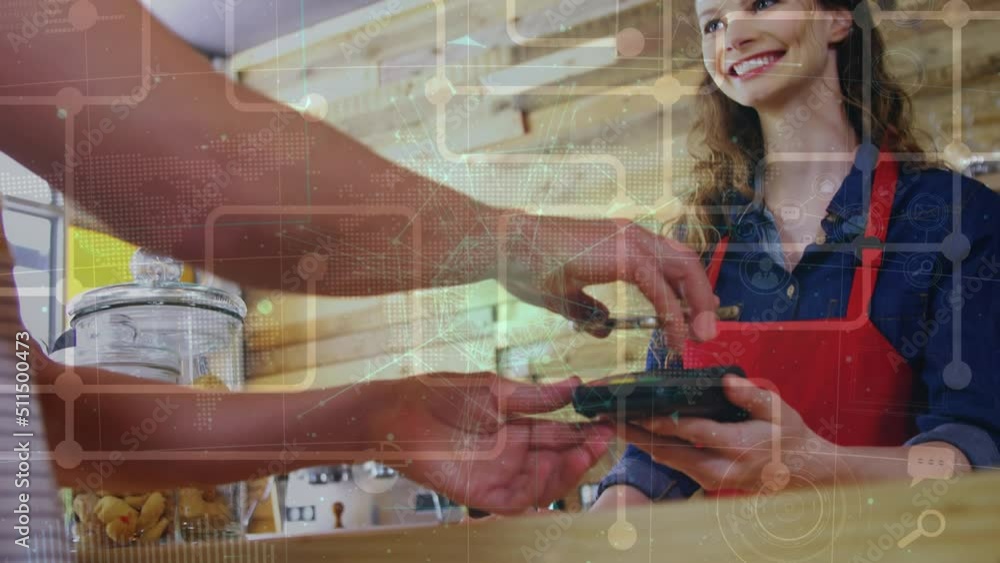Poster network of connections and globe over mid section of a man making a payment using his smartphone