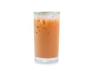Orange Thai iced condensed milk tea in transparent glass isolated on white background with clipping path