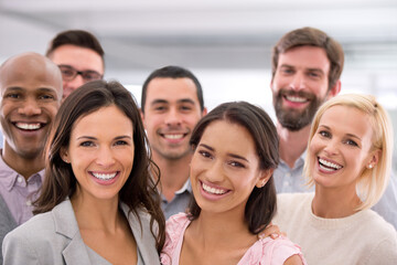 Success would put a smile on your face too. Cropped shot of a group of positive businesspeople.