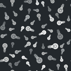 Grey Human head with lamp bulb icon isolated seamless pattern on black background. Vector
