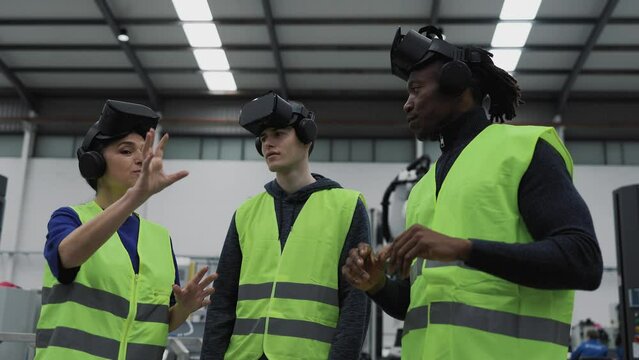 Team of engineers having simulation experience with futuristic virtual reality glasses