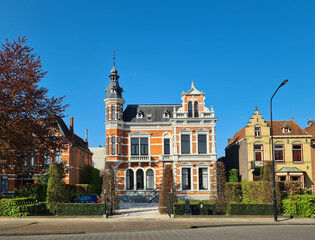 Fototapeta na wymiar Villa in the city Oss (Netherlands) build in 1888 in neo-renaissance style. Because the villa is build by butter manufacturers, it is mostly referred to as 