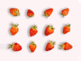 Raw strawberries on white background