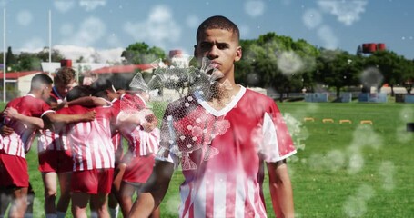 Animation of virus cells over diverse male rugby players teaming up - Powered by Adobe