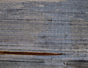 The walls are made of galvanized roofing sheets with some rusting.