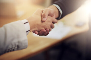 Partnershipits a win win situation. Cropped shot of two businesspeople shaking hands.