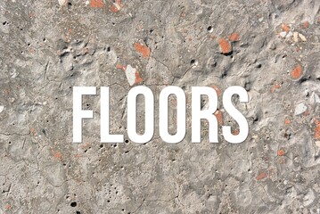floors - word on concrete background. Cement floor, wall.
