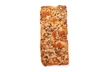Cookies with nuts and seeds of peanut, sunflower seeds, sesame, linen, organic food, isolated on white background.