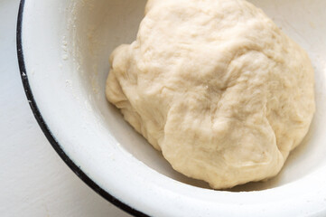 a piece of dough in a bowl