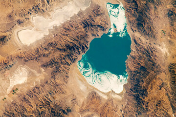 Pyramid Lake, in western Nevada, remnant of the ancient and much larger Lake Lahontan that formed during the last Ice Age. Top view of Pyramid Lake, rock forms.Elements of this image furnished by NASA
