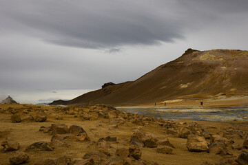 Fototapeta na wymiar Out of this world landscape in Iceland that makes and an impression that people are walking on the surface of planet Mars