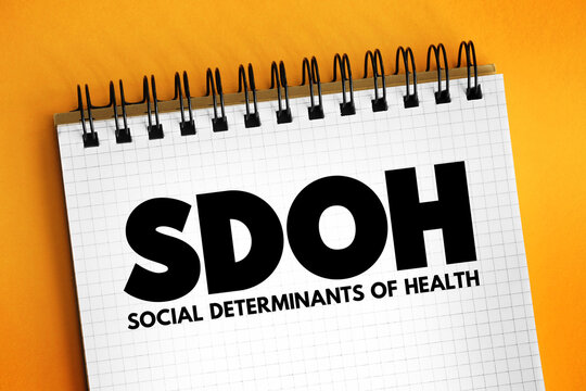 SDOH Social Determinants Of Health - economic and social conditions that influence individual and group differences in health status, acronym concept on notepad