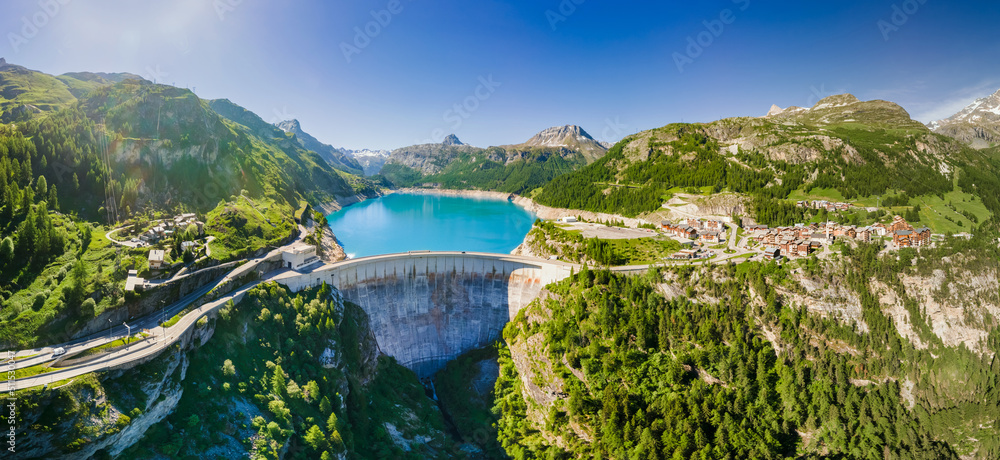 Wall mural water dam and reservoir lake aerial panoramic view in french alps mountains generating hydroelectric - Wall murals