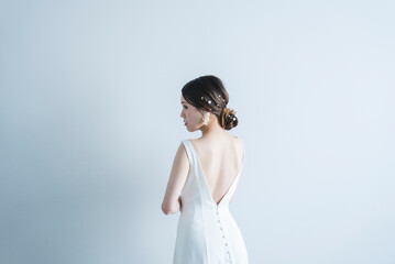 Fototapeta premium ウェディングドレスを着た花嫁