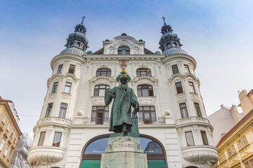 Gutenberg statue in front of the Regensburger Hof building in Vienna, Austria