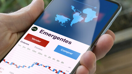Invertir en ETF, un inversor compra o vende un fondo Emergentes etf. Texto en español