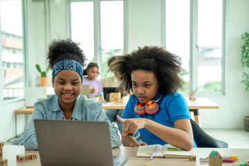 Classroom with Diverse Group of Children Learning New Stuff,African American children In Elementary School Class.