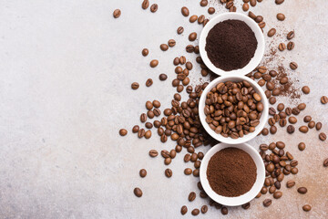 Roasted beans and different ground coffee for morning espresso