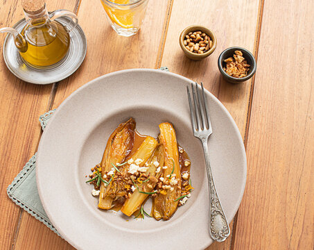 Braised endives with orange juice