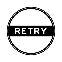 Black color round seal sticker in word retry on white background
