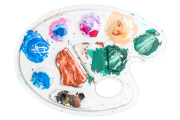 Art palette with stains of watercolor paint