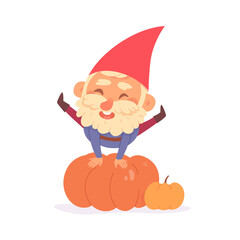 Old funny garden gnome with beard and pumpkin, cute dwarf playing with autumn harvest