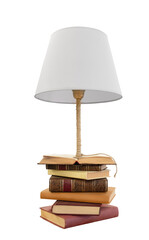 Old classic books stacked with innovative lamp 