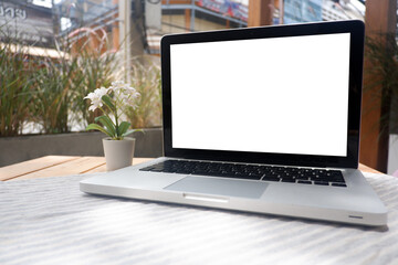 Cropped shot view of office desk table office equipment, labtop, tablet and other office supplies on the modern space, flat lay.