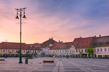 Fototapeta na wymiar European old town. Sunrise in historical center of Sibiu, Romania