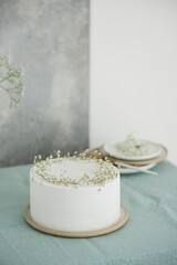 White wedding cake with flowers
