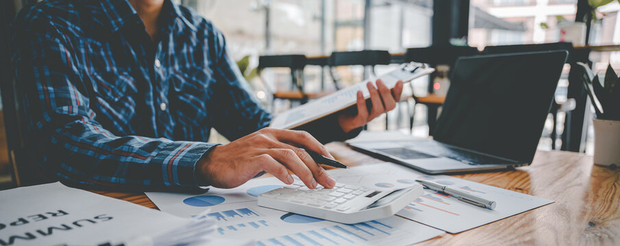 The financiers are calculating personal taxes for their customers.