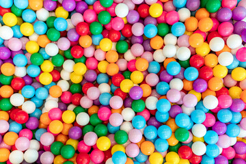 Fototapeta na wymiar various colored plastic balls background