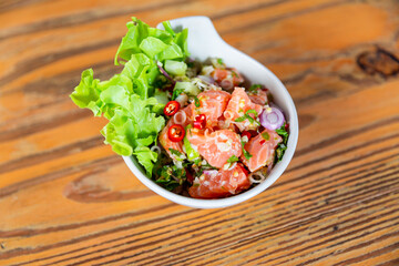 Thai style spicy salmon dice salad named 