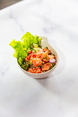 Thai style spicy salmon dice salad named 