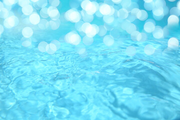 Naklejka na ściany i meble Swimming pool with clear turquoise water. Bokeh effect